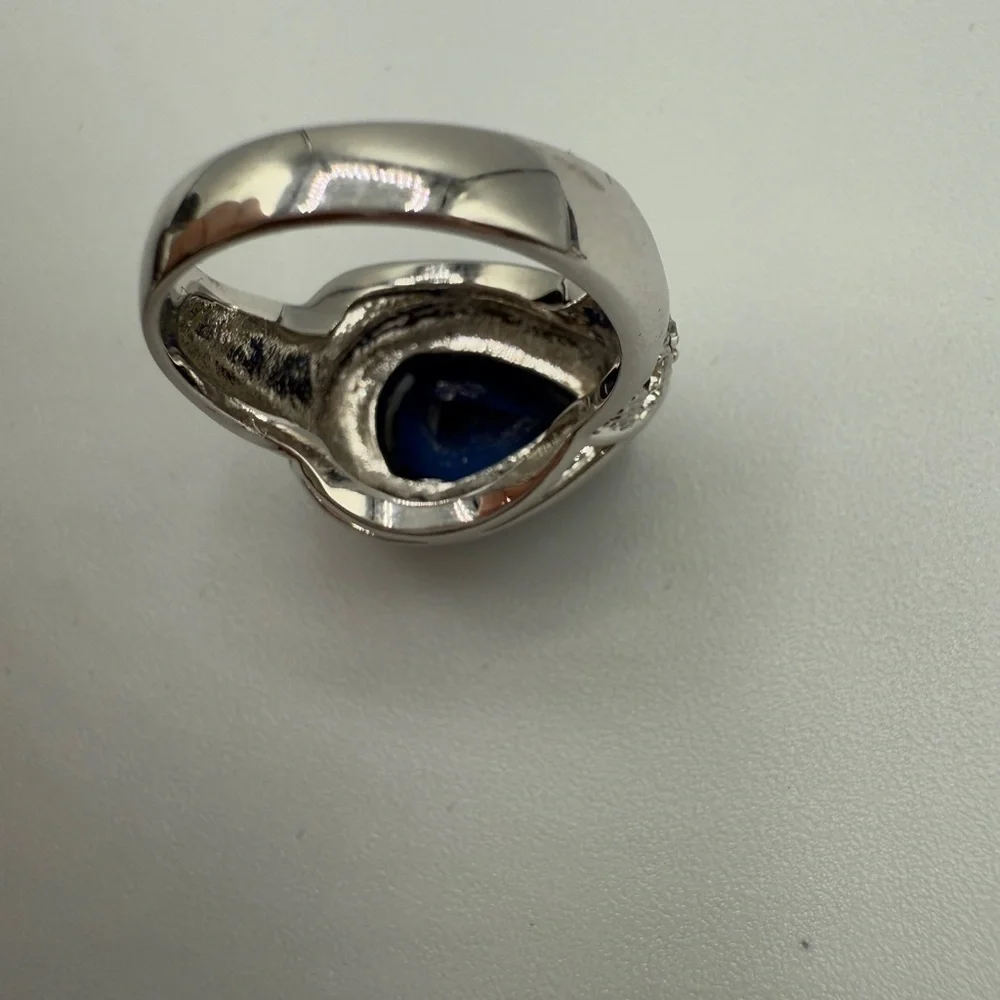 Beautiful Pear-Shaped Blue Glass Halo Ring with CZ Encrusted Base - Statement
